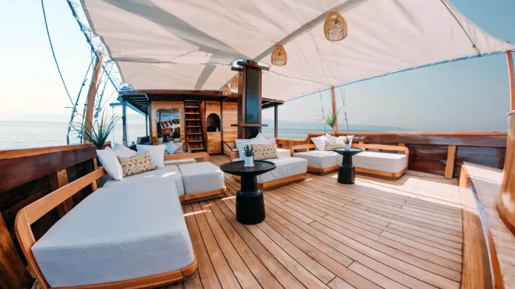 Front deck relax area with open seating on the Angelica phinisi liveaboard