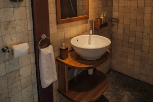 Ensuite bathroom in an upper-deck cabin aboard Amira