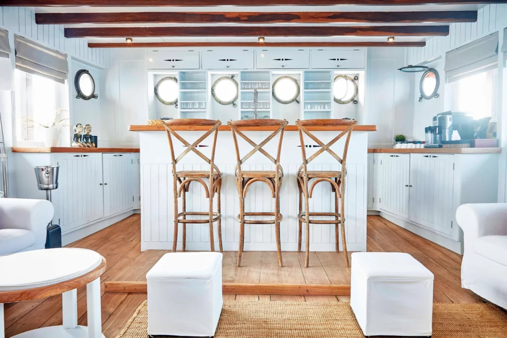 Mischief Voyage indoor lounge and dining area