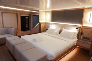Double bed in the Adonara master cabin aboard Mosalaki