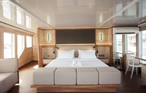 Wide interior view of the Adonara master cabin aboard Mosalaki