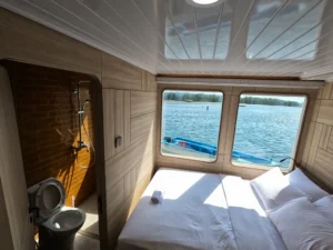 Sea-view interior of the Lamalera private cabin aboard Mosalaki