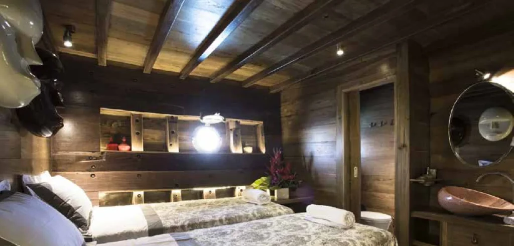 Twin cabin with two separate beds aboard Tiare Cruise