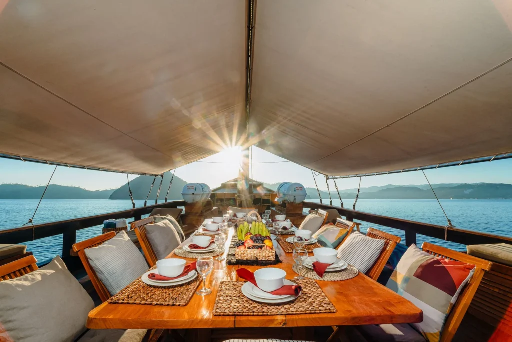 Adishree sundeck outdoor dining 01 aboard Adishree phinisi