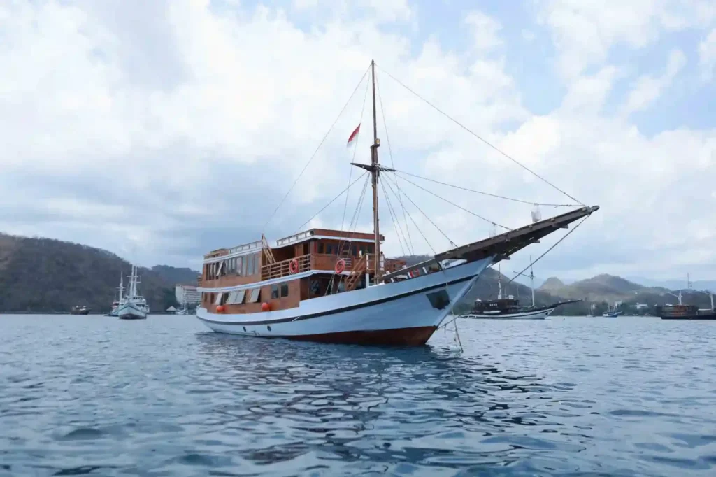 Aimar Cruise at anchor off an island in Komodo National Park