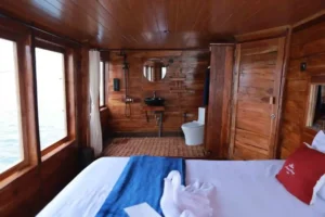 Interior of an Aimar Cruise master cabin with ensuite bathroom