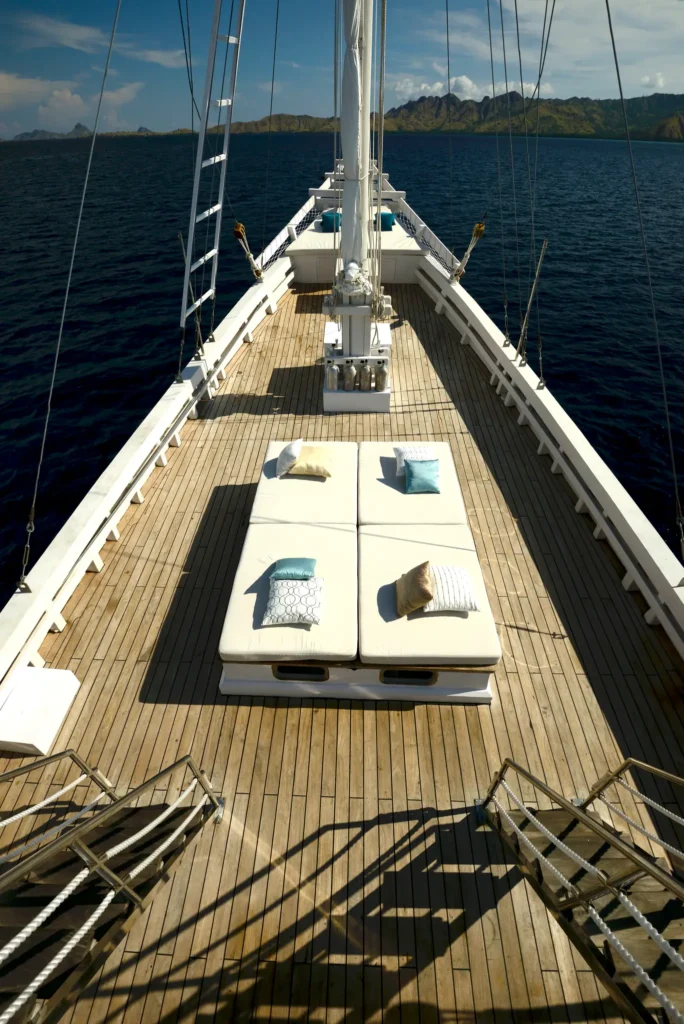 Top-down view of Alexa's foredeck lounge and dining setup