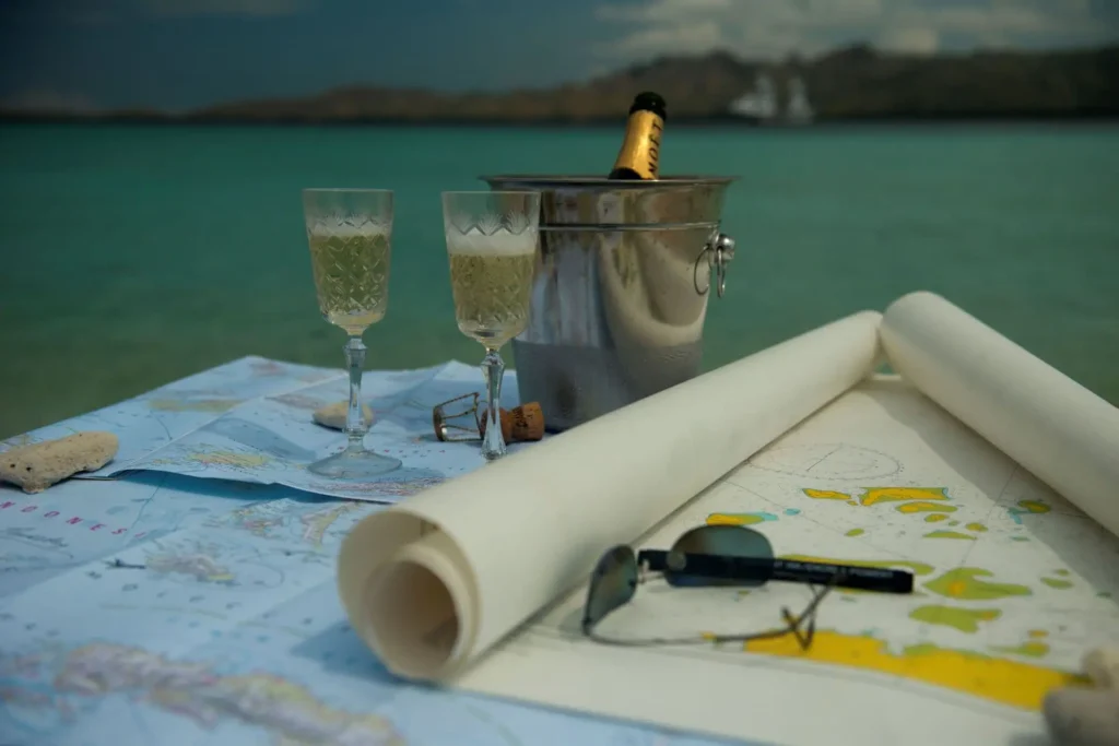 Navigation chart and champagne prepared aboard Alexa
