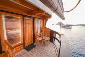 Senggigi Room on Alfathran 3 with private balcony doors opening to the sea