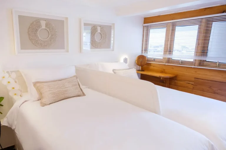 Sea-view window in the Koon cabin aboard Aliikai Voyage