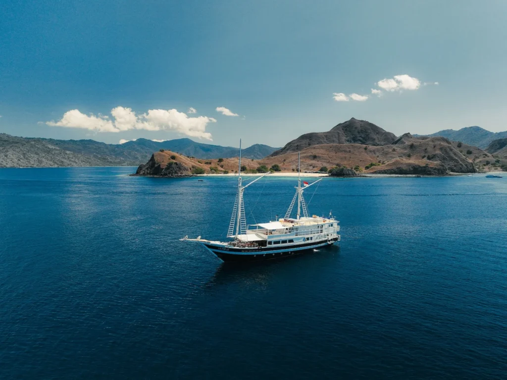 Aerial view of Aliikai Voyage anchored near Indonesian islands