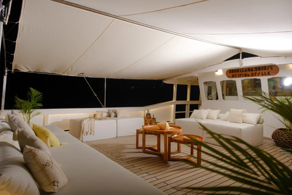 Shaded relaxation space on the upper deck of Aliikai Voyage