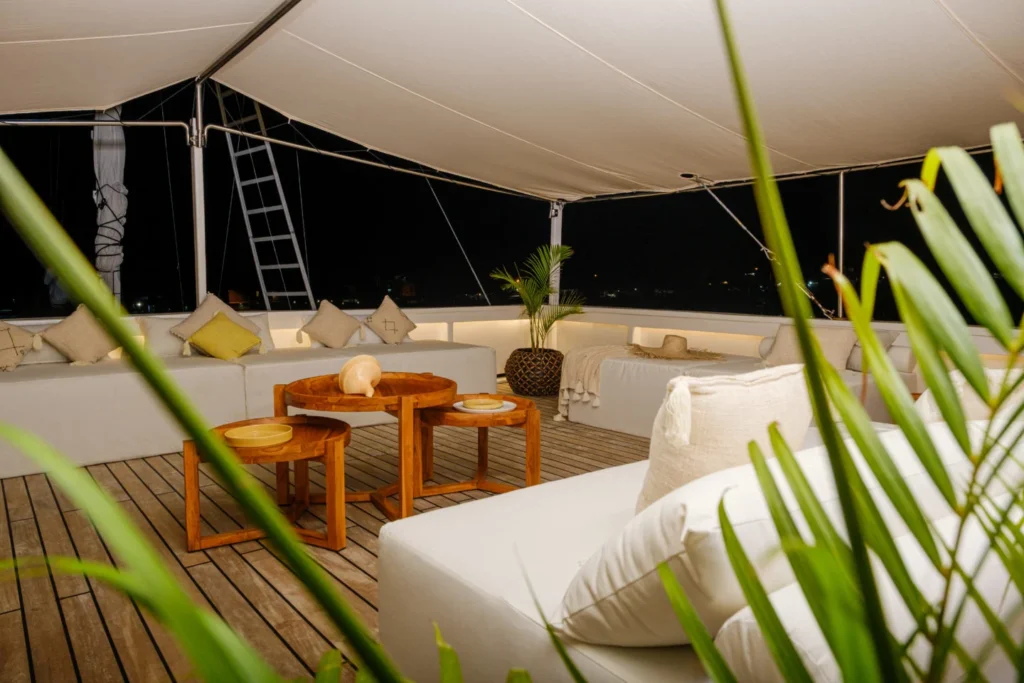 Cushioned seating in the upper deck lounge of Aliikai Voyage