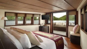 Sriwijaya Master Suite with wraparound windows aboard Alila Purnama