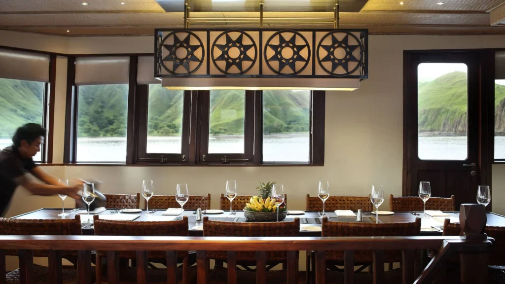 Majapahit Lounge seating and dining area aboard Alila Purnama