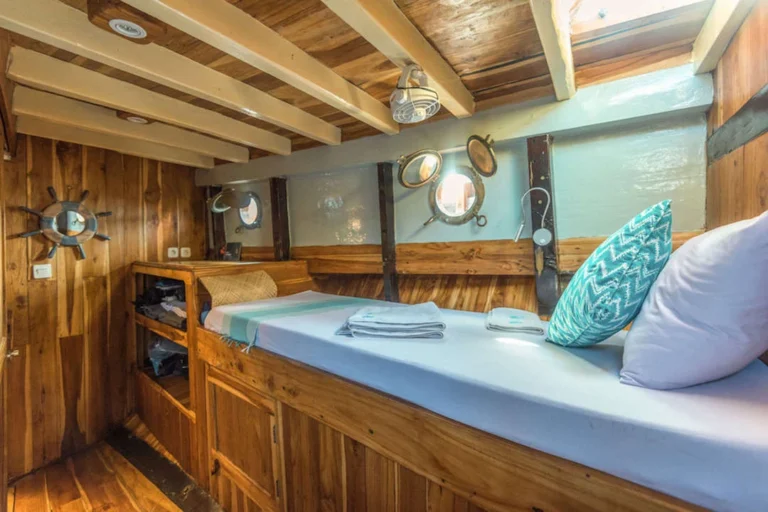 Family cabin with one double and one single bed aboard Amalia Komodo
