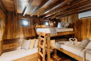 Lower-deck double bunk-style cabin aboard Andamari