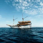Andamari, a 30-metre phinisi launched in 2019, sailing in Komodo National Park