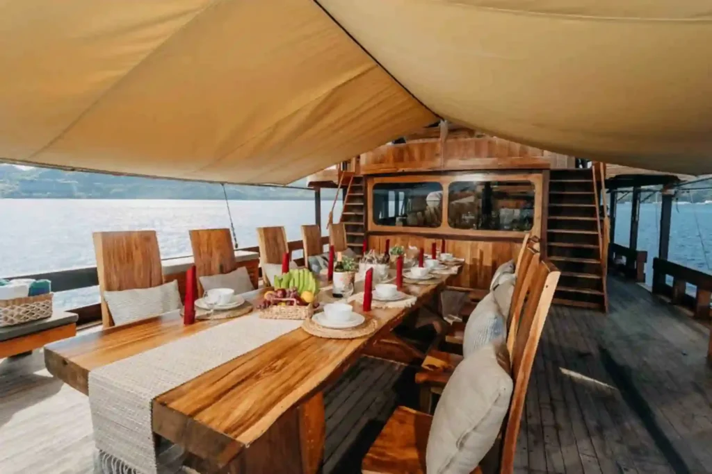 Second view of the covered outdoor dining area aboard Andamari