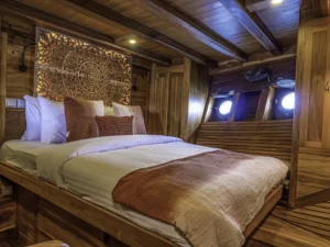 Master cabin with king bed aboard Anne Bonny