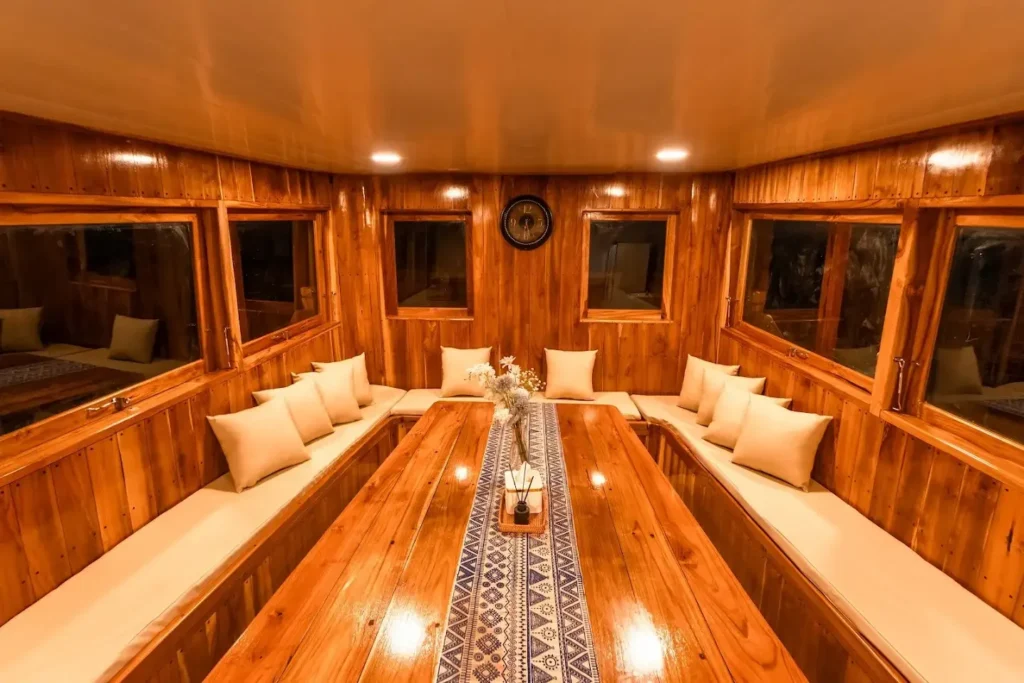 Indoor dining area aboard Ayvara