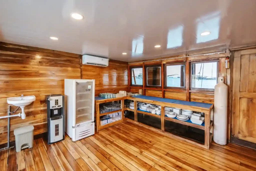 Interior dining area aboard Baraka phinisi