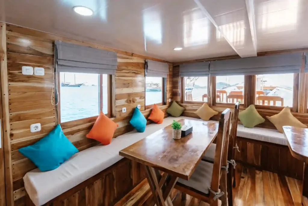 Interior dining area aboard Baraka phinisi