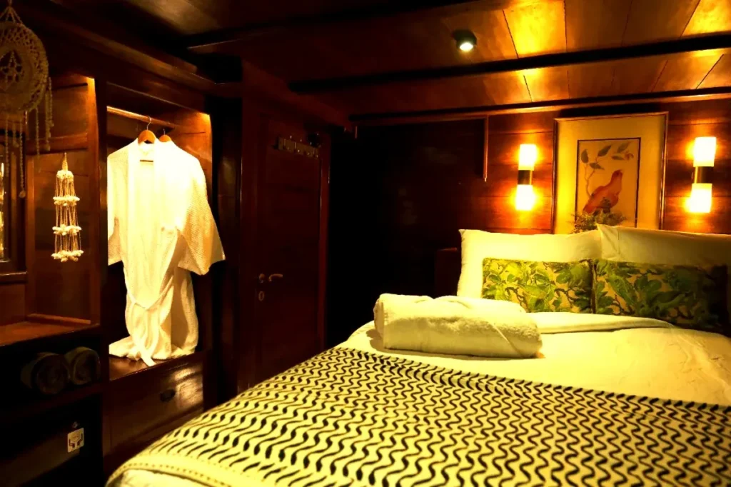 Master Suite Balcony cabin bedroom aboard Behike