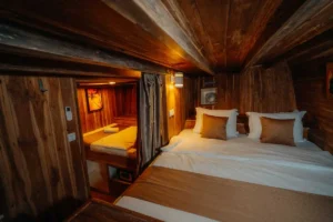 Lower-deck guest cabin interior aboard Cajoma IV