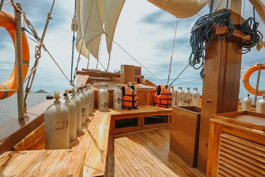 Scuba cylinders secured on the dive deck aboard Cajoma IV