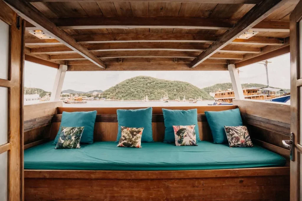 Indoor lounge aboard Cajoma IV phinisi