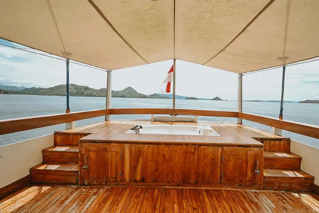 Shaded upper-deck area aboard Cajoma IV phinisi