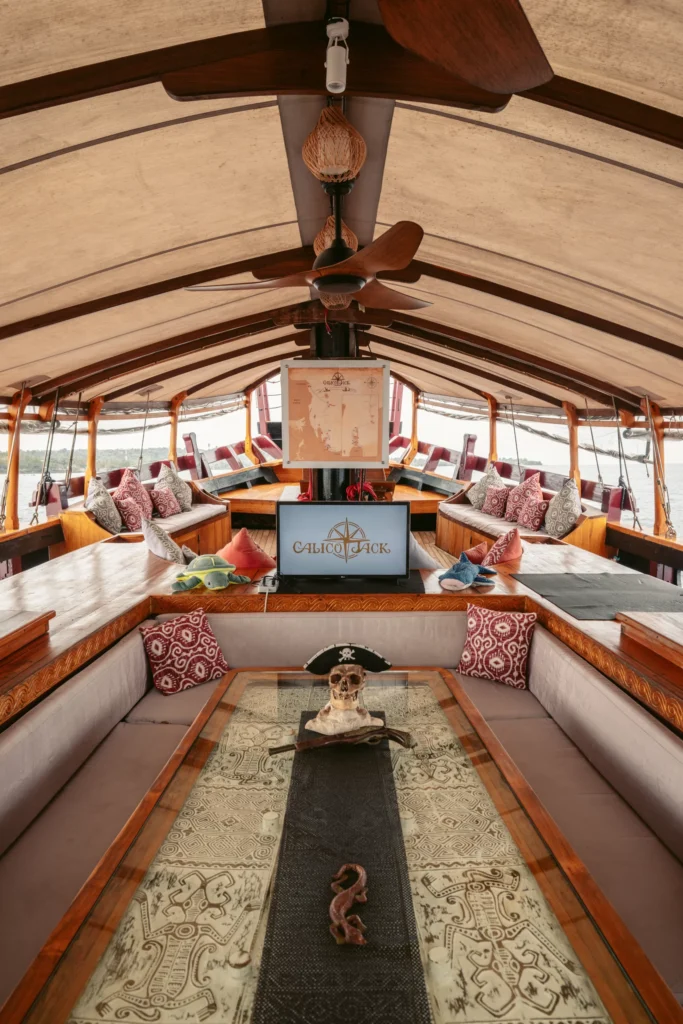 Foredeck table and seating aboard Calico Jack