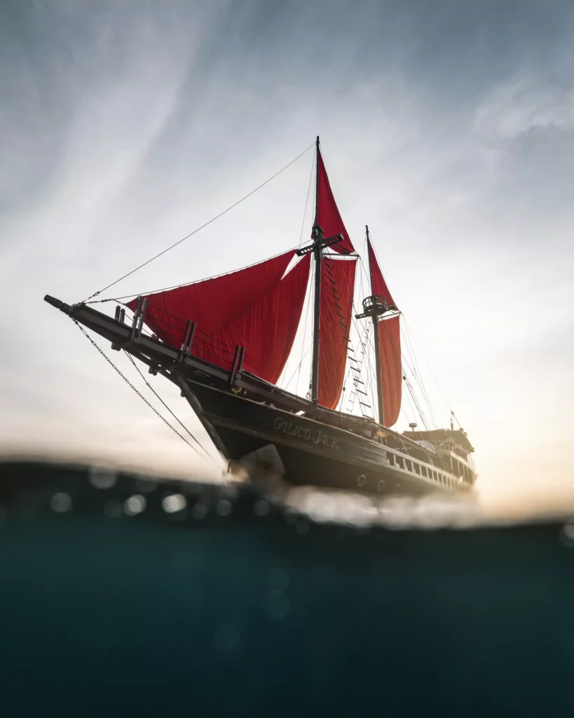 Red sails of the Calico Jack phinisi