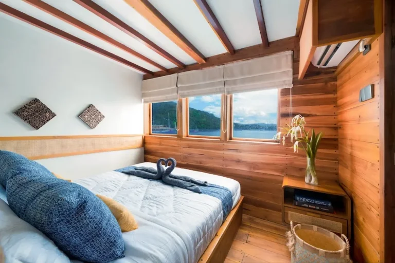 Grandis 1 and 2 cabin on Catnazse with queen bed and sea-view windows