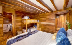 Grandis 3 and 4 cabin on Catnazse with a queen bed plus bunk beds, sold five different ways
