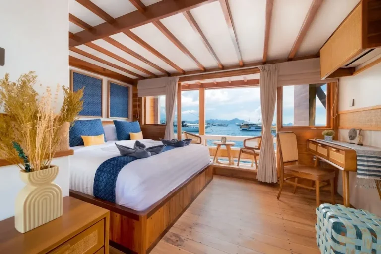 Santalum 2 balcony cabin on Catnazse with a king bed and sea-view windows