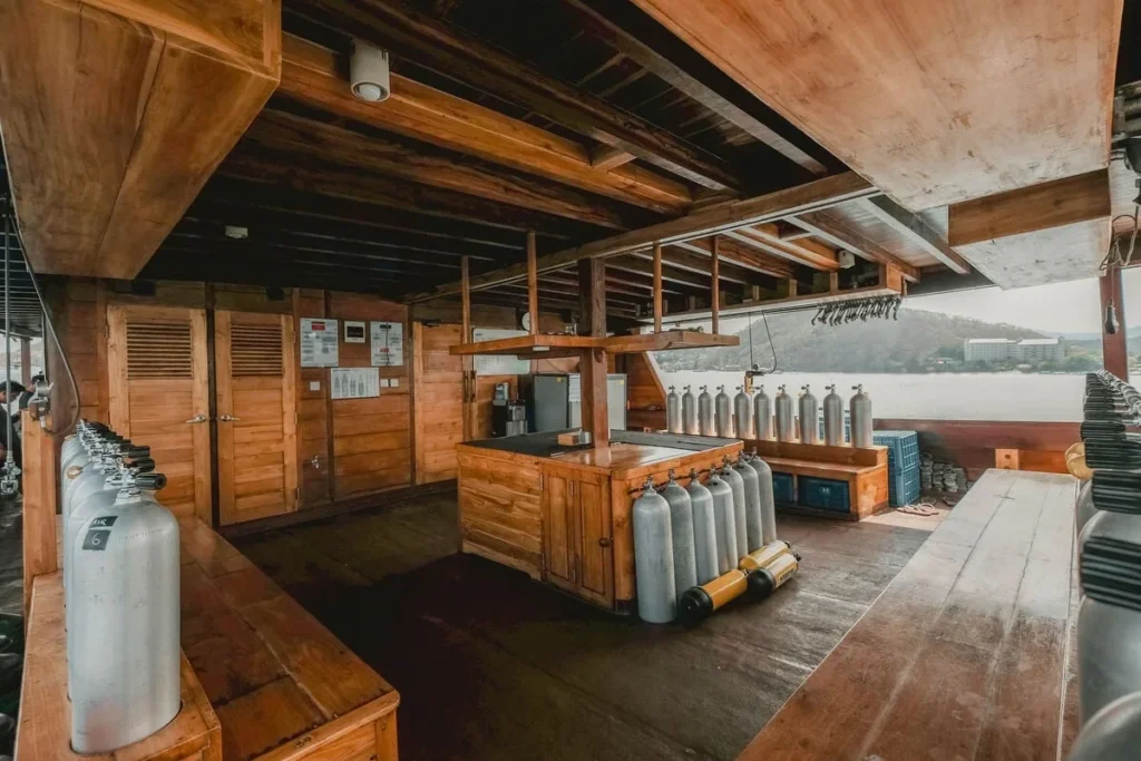 Spacious dive deck aboard Indo Master with cylinders and camera facilities