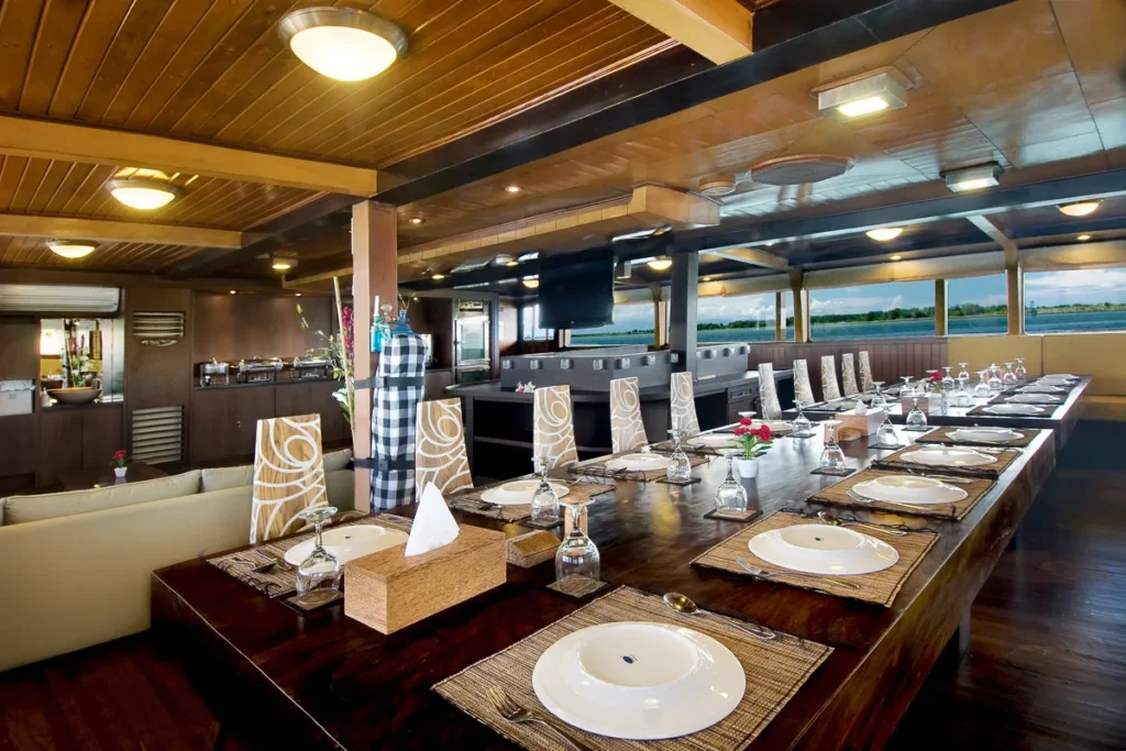 Indoor restaurant and dining tables aboard Cheng Ho