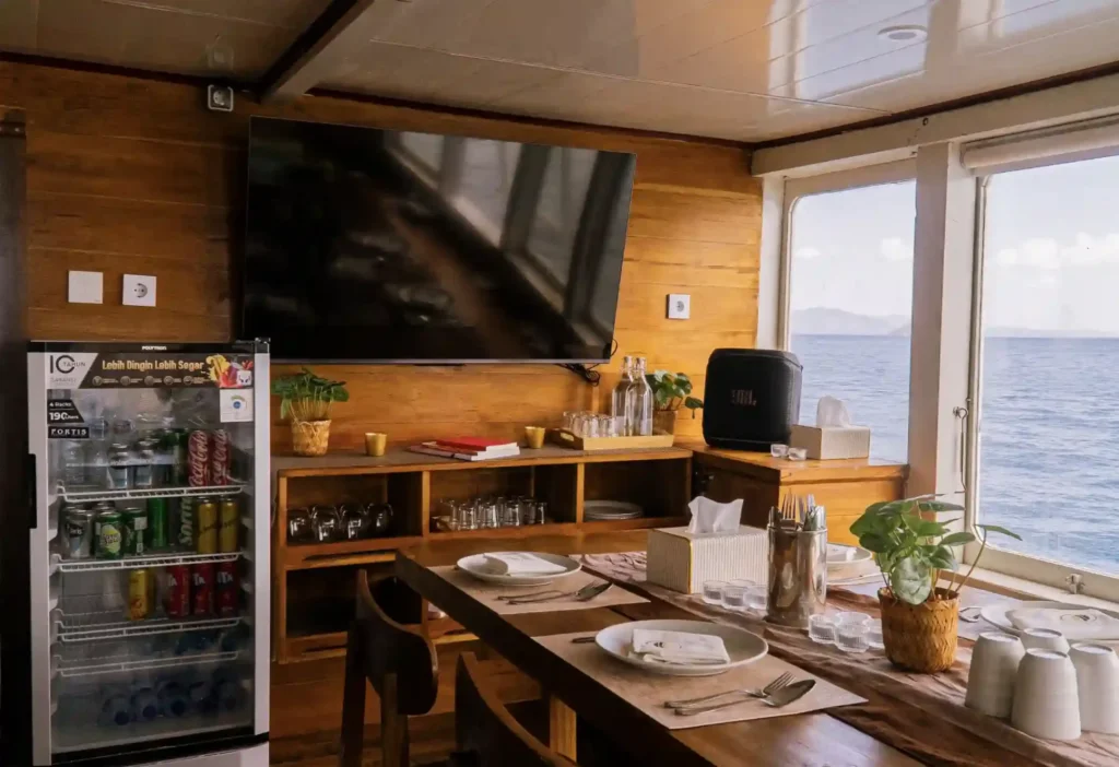 Indoor dining room on Chrisbow Azure where three meals a day are served
