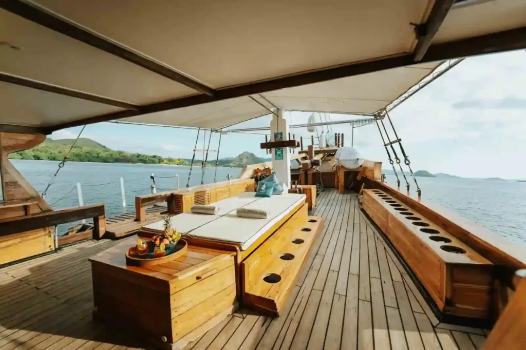Two kayaks and a paddleboard carried aboard Cordelia for guest use