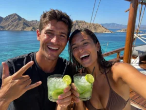 Couple enjoying a boat trip from Lombok to Komodo