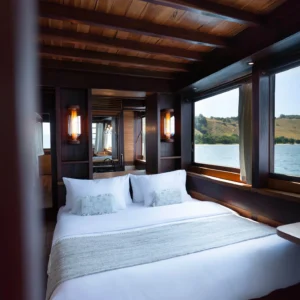 Master cabin with queen-size bed aboard Dewata