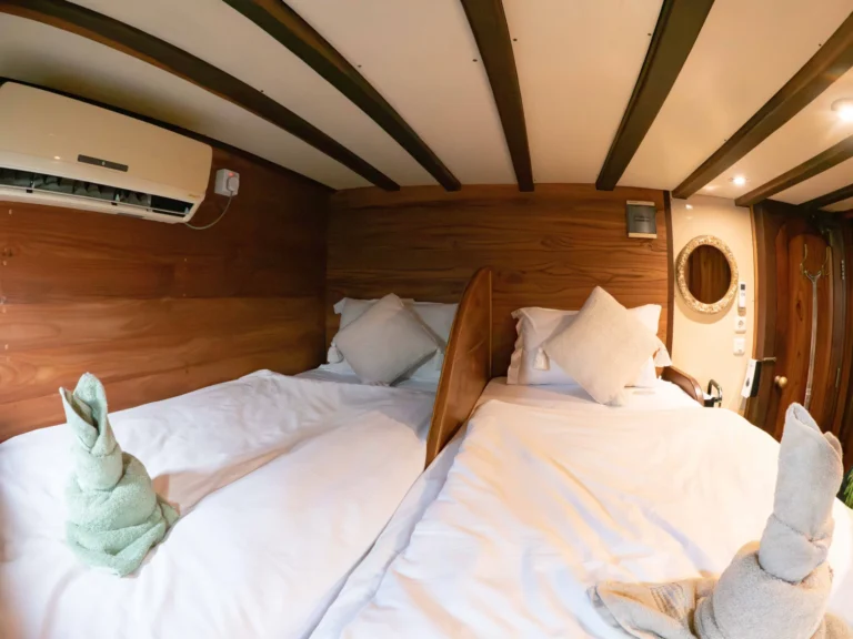 EcoPro Duyung Baru lower-deck double cabin separated into twin beds
