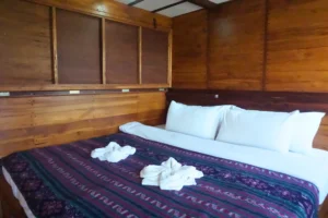 Intsia master cabin on the upper deck of EcoXplorer