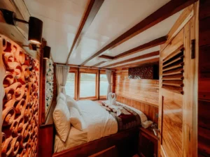 Interior of the Nakula and Sadewa upper deck double cabin aboard Gandiva Phinisi