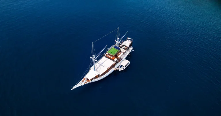 Ikan Kayu phinisi yacht from the air in Komodo National Park