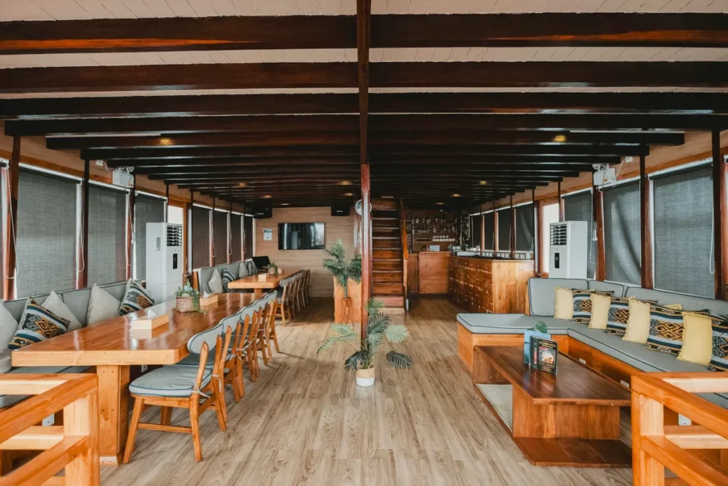 Indoor lounge and dining area aboard Indo Master