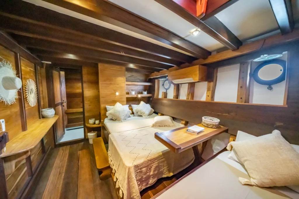 Orchid premium cabin on Jakare, matching Lotus in grade with a 140 cm double and a single bed