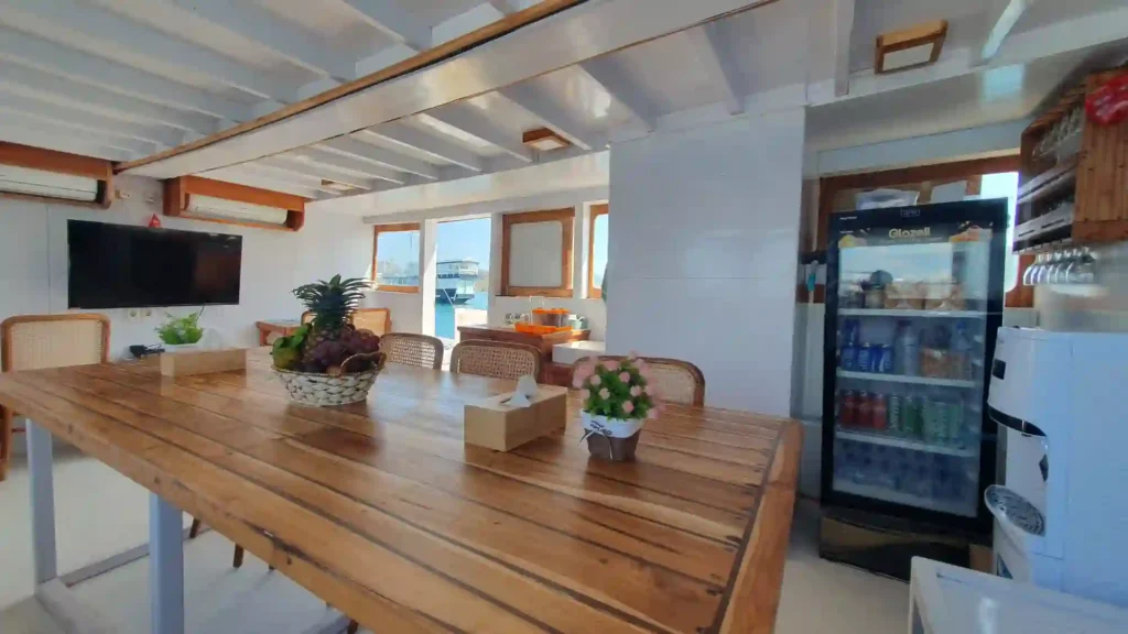 Indoor dining and living room aboard Jessie phinisi